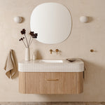 ADP Surry Imperial wall-hung vanity with fluted white top, light timber cabinet and round basin in a warm bathroom setting