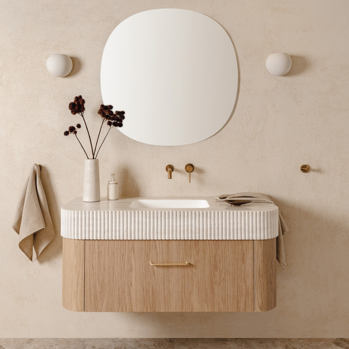 ADP Surry Imperial wall-hung vanity with fluted white top, light timber cabinet and round basin in a warm bathroom setting