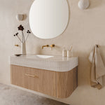 ADP Surry Imperial wall-hung vanity with fluted white top, timber-look base and centre basin in a styled bathroom