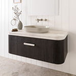 ADP Royale vanity benchtop with bullnose edge, light stone finish, shown fitted to dark timber wall-hung vanity.