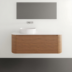 ADP Surry wall hung vanity in woodgrain with white benchtop and curved front, shown with round basin in bathroom setting