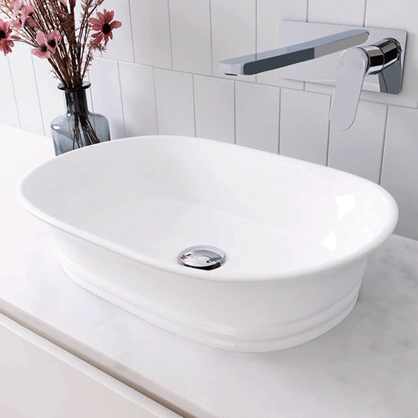 ADP Titan white oval above counter basin on vanity with wall-mounted tap and chrome waste