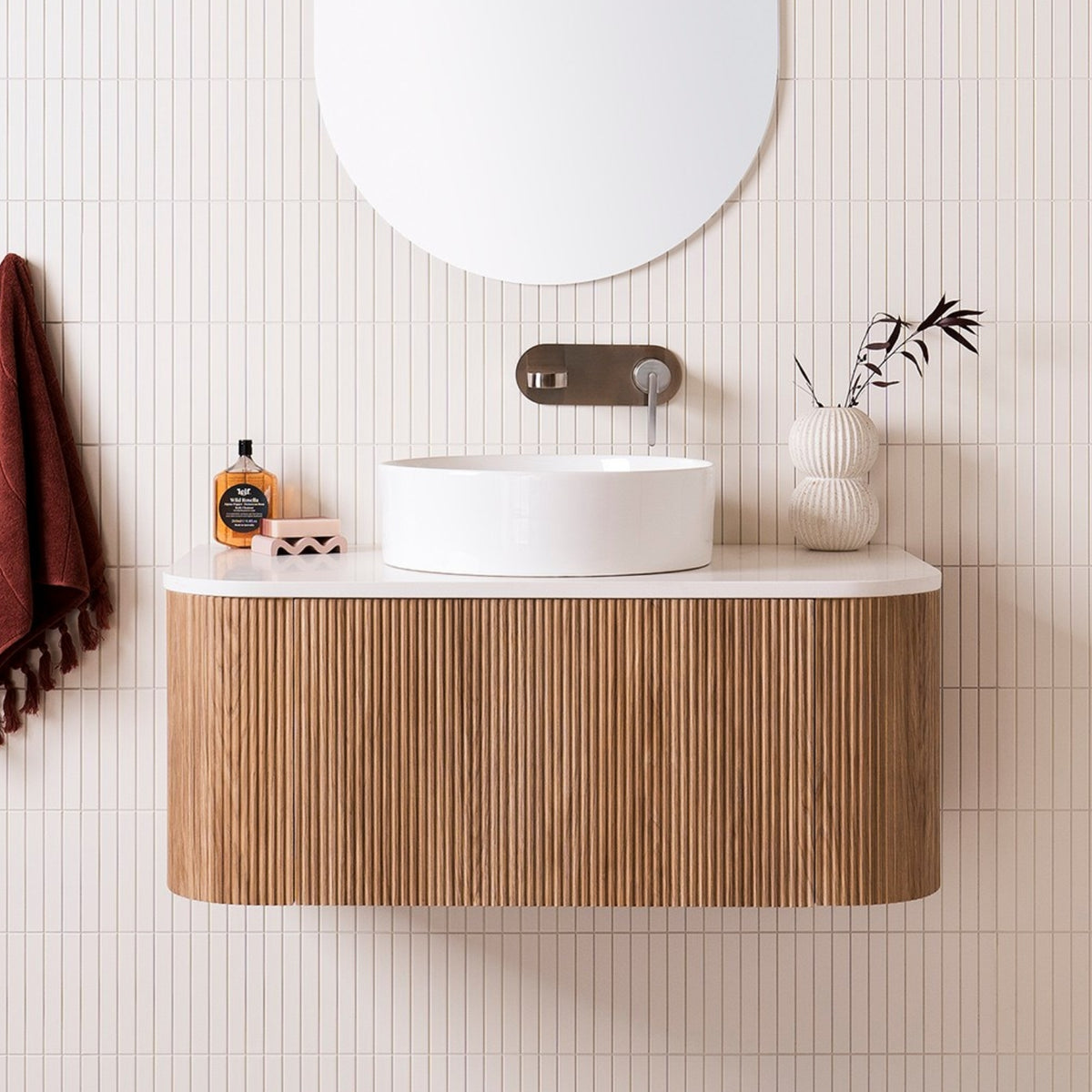 ADP Waverley wall-hung vanity in Prime Oak woodgrain with white benchtop and round basin in a bathroom setting