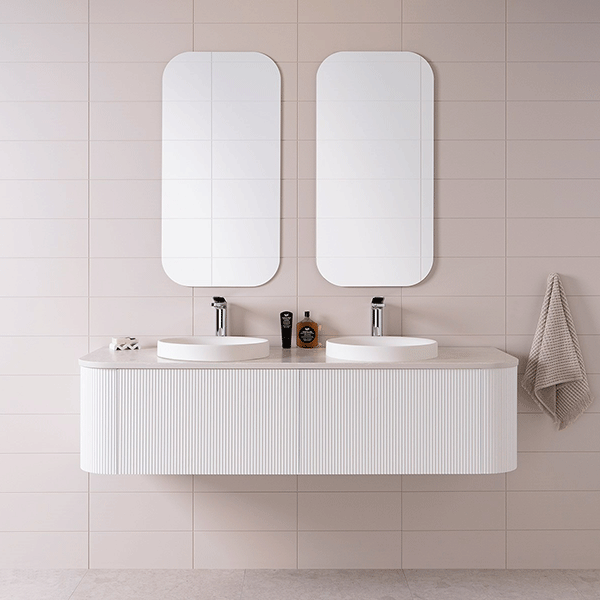ADP Waverley wall-hung vanity in white woodgrain, with twin round basins and curved drawers, shown in bathroom setting