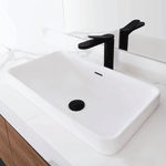 ADP Zeya rectangular solid surface inset basin in gloss white, with overflow, on a white vanity with black tapware.