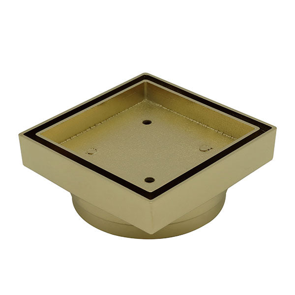 ART Australia Bermuda square tile insert floor waste, gold brass finish, 100mm outlet, angled view