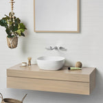 Caroma Artisan white above counter basin, curved square shape on a timber vanity, lifestyle bathroom view
