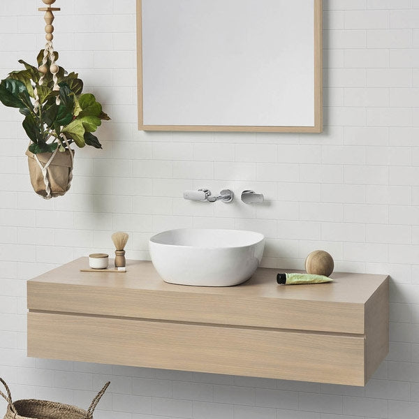 Caroma Artisan white above counter basin, curved square shape on a timber vanity, lifestyle bathroom view