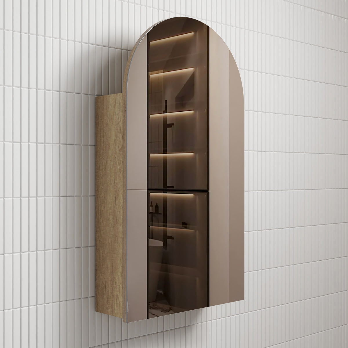 Aulic Canterbury arch shaving cabinet in Carita finish, with mirrored door and woodgrain side, wall mounted in bathroom tile.