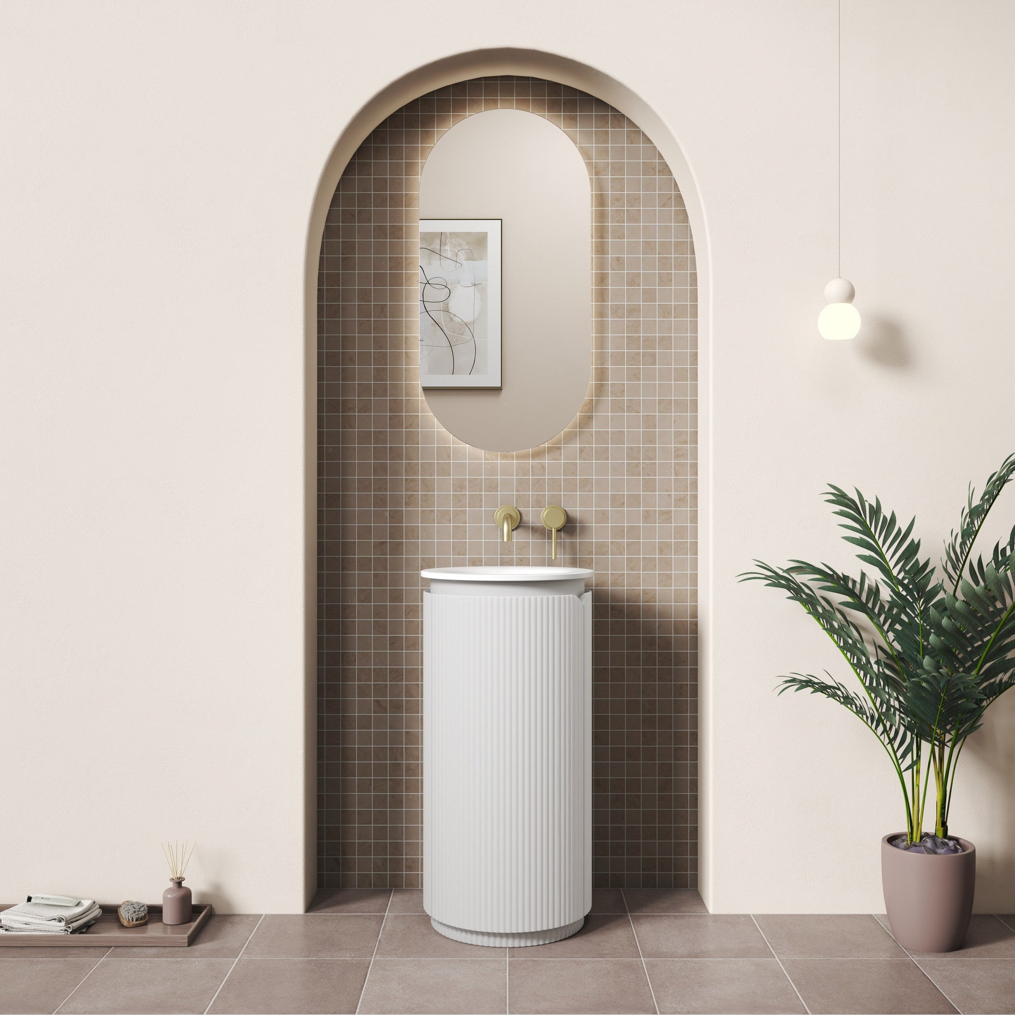 Aulic Civaro matte white floor-standing pillar vanity with fluted round front and white top in a styled bathroom alcove