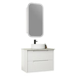 Aulic Flauto wall hung vanity with fluted white drawers, stone top and round basin, shown with arch mirror and tap.
