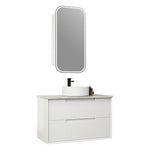 Aulic Flauto wall hung vanity with fluted white drawers and crystal ceramic top, shown with round basin and mirror cabinet above