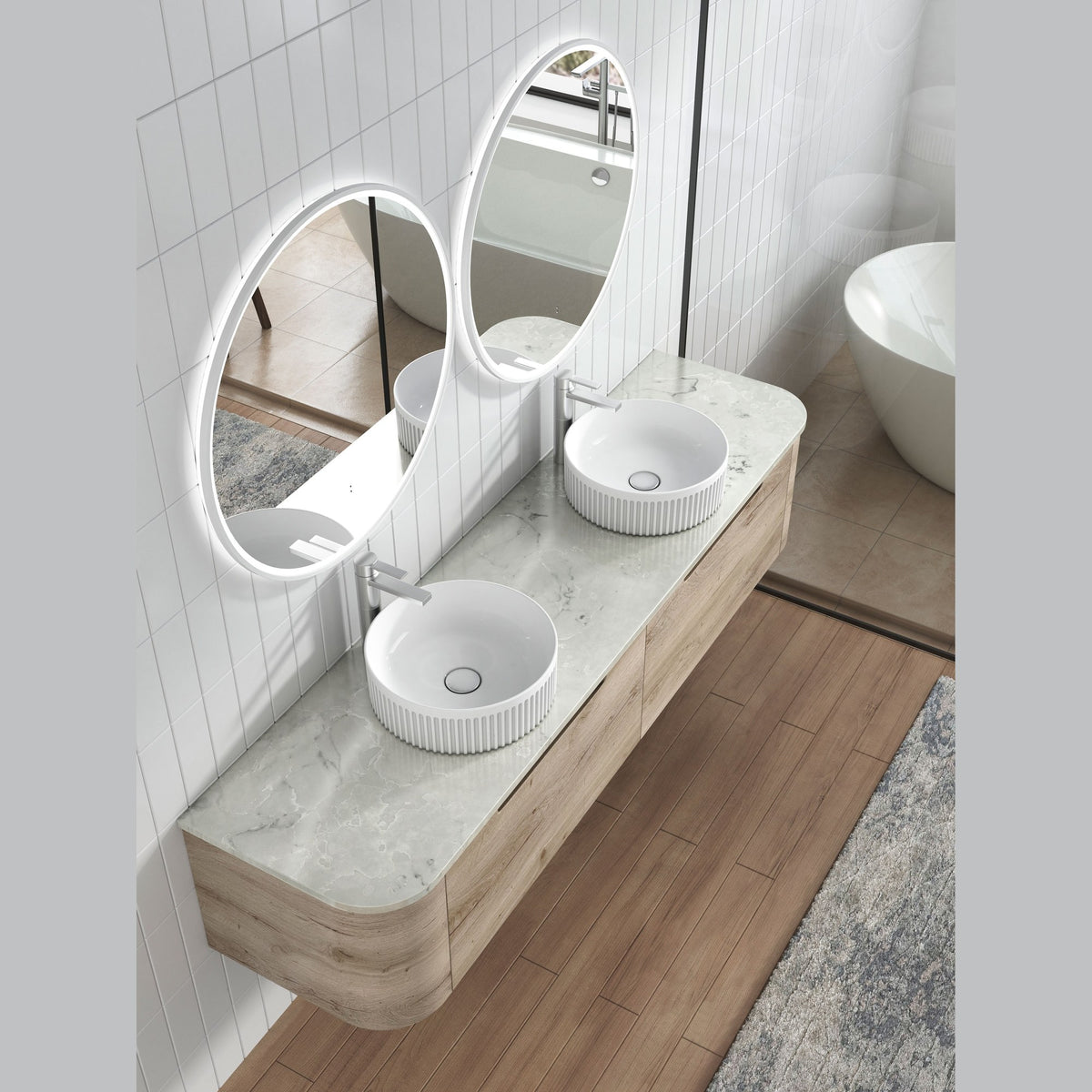 Aulic Hamilton wall hung vanity with curved timber grain ends, stone-look top and twin round vessel basins in a bathroom setting