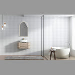 Aulic Hamilton woodgrain wall hung vanity with curved ends, shown in a modern bathroom setting with basin and mirror