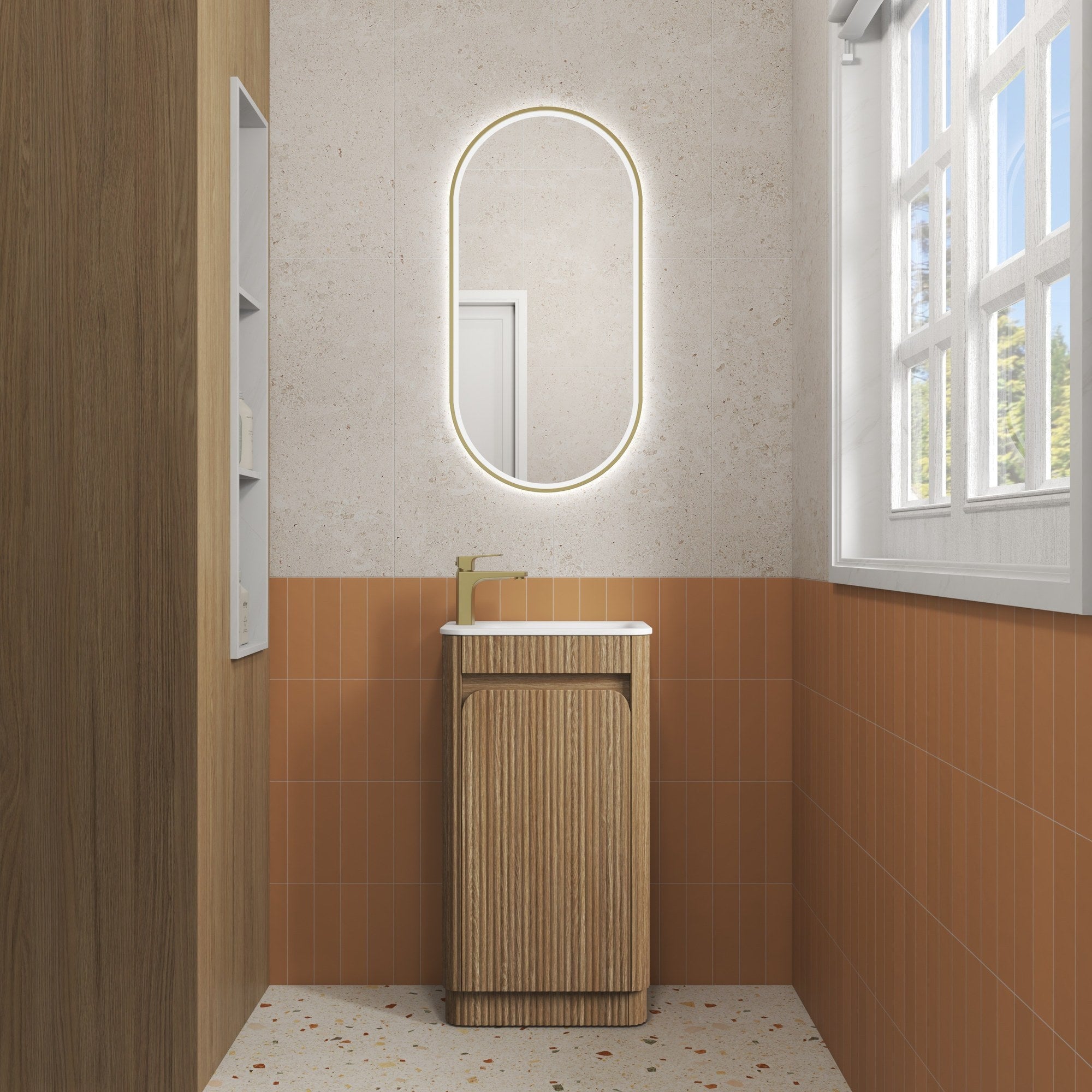 Aulic Mini Hartelle floor standing vanity in Harvest Oak with fluted front, white top and single door in a small bathroom