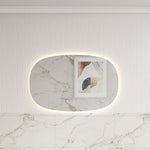 Aulic Valmont horizontal LED mirror in a rounded rectangle shape, backlit on a marble-look bathroom wall