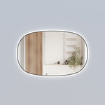 Aulic Valmont horizontal LED mirror with black frame, rectangular rounded corners and soft backlit glow in bathroom setting