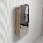 Aulic Vienna 450mm shaving cabinet in Carita woodgrain, wall-mounted with mirrored door on a tiled bathroom wall
