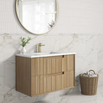 Aulic Voulari wall hung vanity in Harvest Oak, with white top and basin, shown in a modern bathroom setting