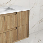 Aulic Voulari wall hung vanity in Harvest Oak, with white stone-look top and drawers in a bathroom setting