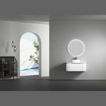 Aulic Windsor round LED mirror with halo light above a white fluted vanity in a modern bathroom setting