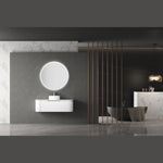 Aulic Windsor round LED mirror above a white vanity in a modern bathroom display, with glowing backlit edge