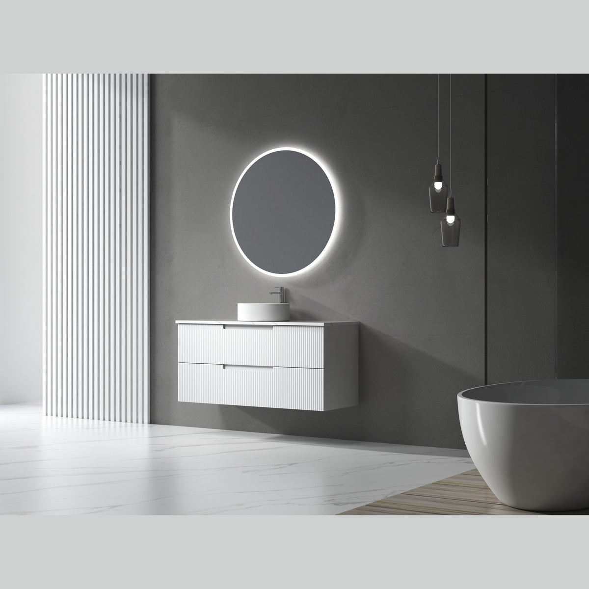 Aulic Windsor round LED mirror above a white vanity in a modern bathroom, with backlit glow and a frameless look