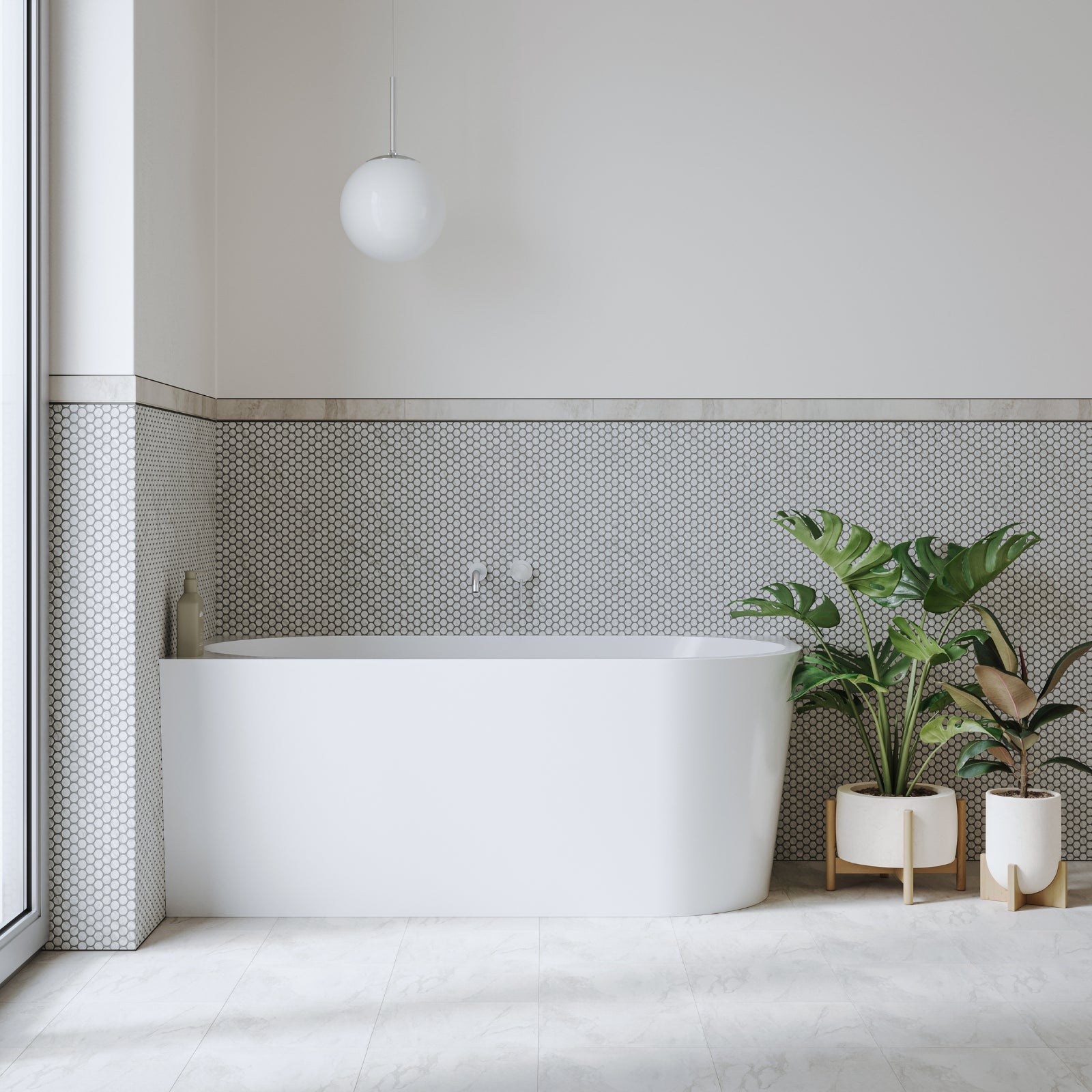 Bao Bon gloss white back to corner bath in a tiled bathroom, shown front view with plants and pendant light