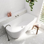 Bao Elegant white acrylic back-to-corner bath in a bright bathroom, shown with centre waste and wall-mounted tapware