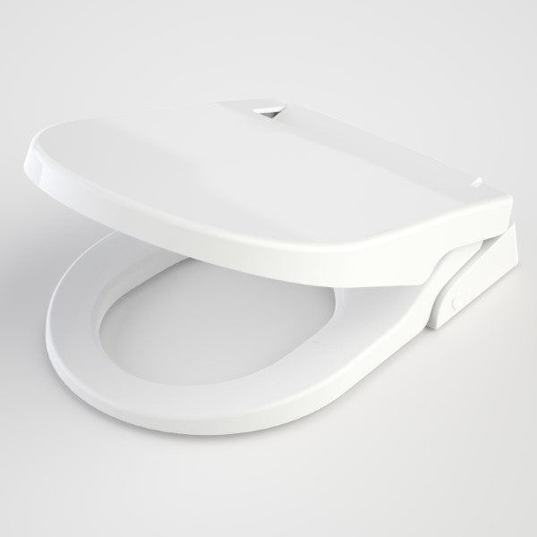 Caroma white electronic bidet toilet seat with closed lid, angled product view