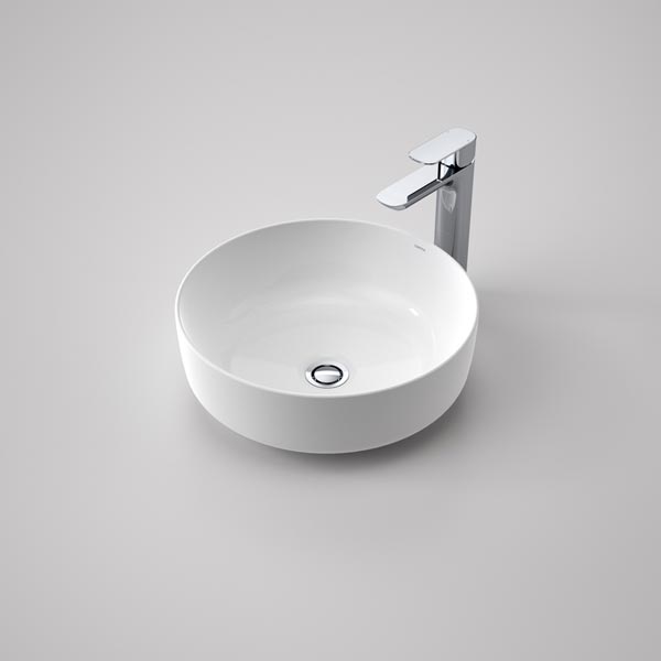 Caroma Tribute round white above counter basin with chrome mixer tap, 405mm, on grey background