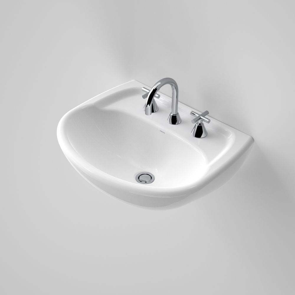 Caroma Caravelle wall basin in white vitreous china, 3 tap holes, shown wall-hung with chrome tapware