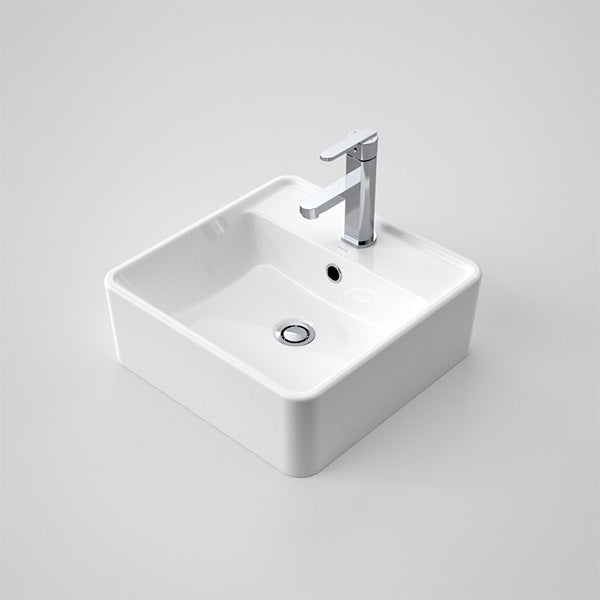 Caroma Carboni II white above counter basin, square ceramic with soft corners and single taphole, shown with chrome mixer tap and waste