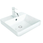 Caroma Carboni white seamless inset vanity basin, square ceramic with chrome waste and plug, angled view