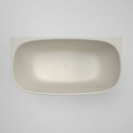 Caroma Contura II back to wall freestanding bath in matte clay, oval top view with centre waste