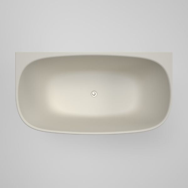 Caroma Contura II back to wall freestanding bath in matte clay, oval top view with centre waste