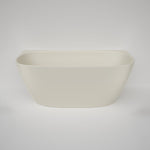 Caroma Contura II back to wall freestanding bath in matte clay, oval acrylic bath with slim rim and centre waste opening