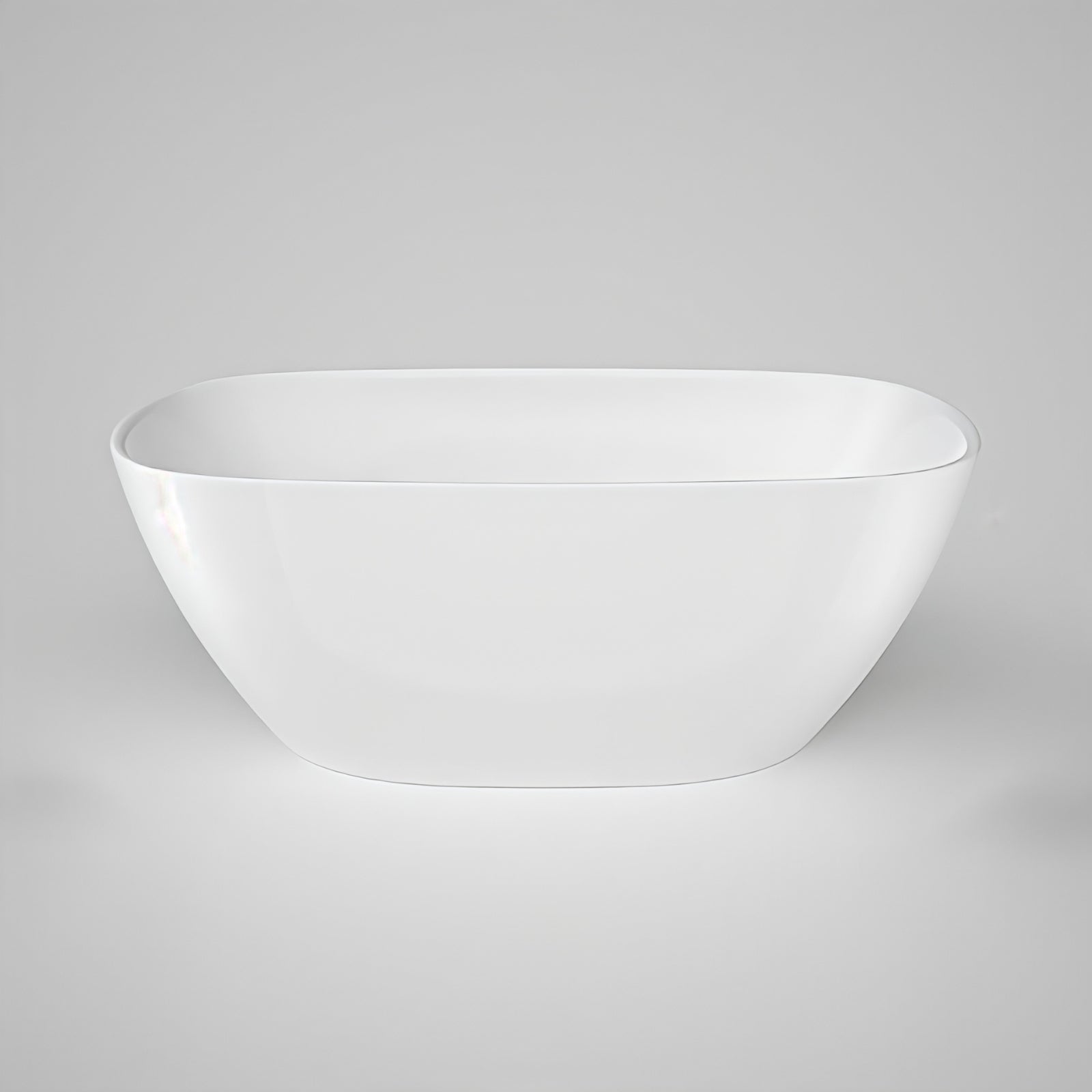 Caroma Contura II white freestanding bath, rounded oval shape, front view on a grey background