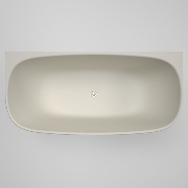 Caroma Contura II matte clay oval bath, top view, with centred waste and back-to-wall straight edge