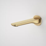 Caroma Contura II wall-mounted basin/bath outlet in brushed brass, shown in side view against a white background
