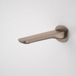 Caroma Contura II wall-mounted basin/bath outlet in brushed bronze, side view with 180mm spout