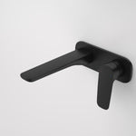 Caroma Contura II wall basin/bath mixer in matte black, wall-mounted with slim lever handle and 180mm spout