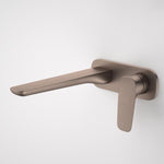 Caroma Contura II wall basin/bath mixer in brushed bronze, shown in a side view on a white wall.