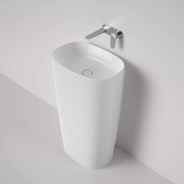 Caroma Contura II white freestanding ceramic basin with oval bowl and wall-mounted mixer tap