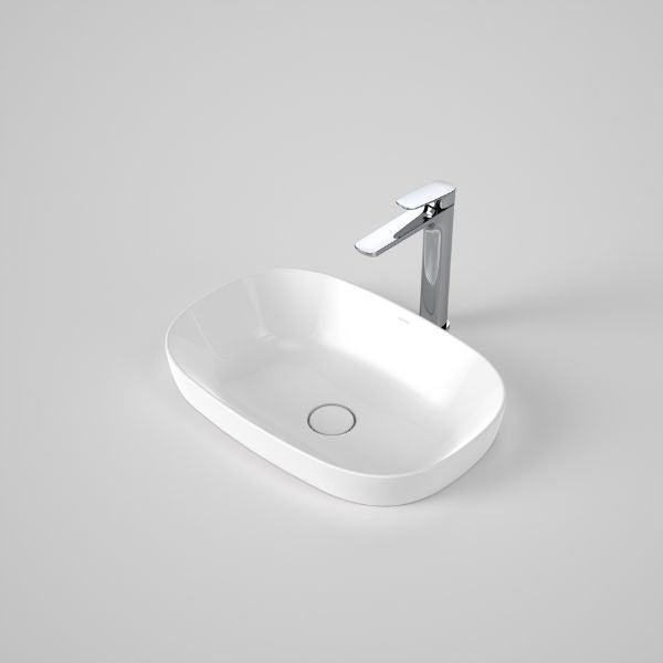 Caroma Contura II white oval inset basin with chrome mixer tap, modern ceramic bathroom basin on a grey background