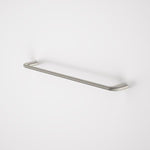Caroma Contura II brushed nickel single towel rail, 620mm, wall-mounted with rounded ends on white background