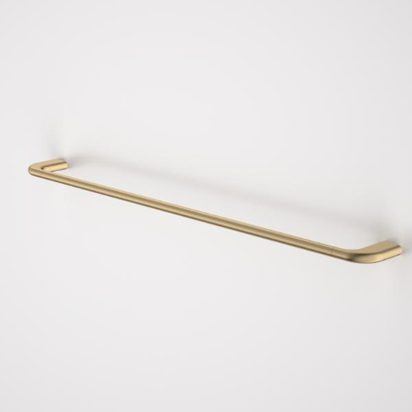 Caroma Contura II single towel rail in brushed brass, shown from an angled front view on a white background