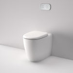 Caroma Contura II wall-faced toilet suite in white with concealed cistern and dual flush buttons, front view in a minimalist bathroom
