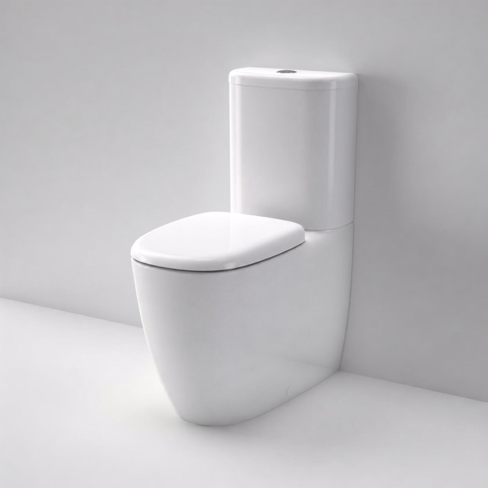 Caroma Contura II wall-faced close coupled toilet suite in white, with rounded cistern and seat, front view