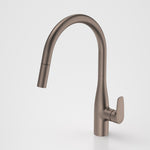 Caroma Contura II pull out sink mixer in brushed bronze, shown in front view on white background